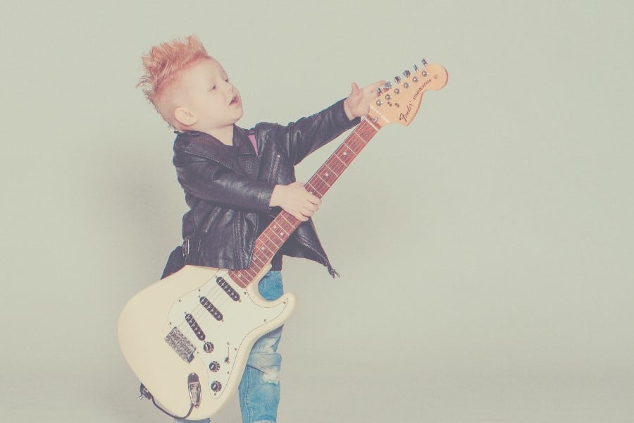 Toddler with electric guitar