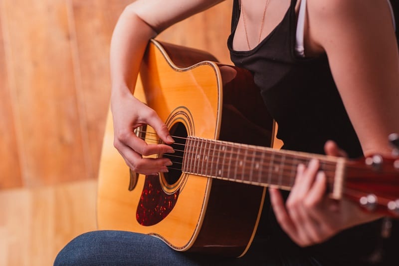 Strumming with Long Nails