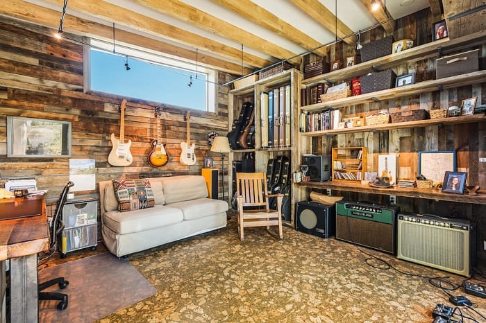 music room with exposed wood ceiling and walls