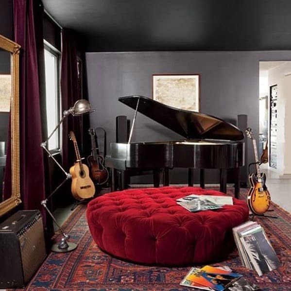  music room with couch and piano